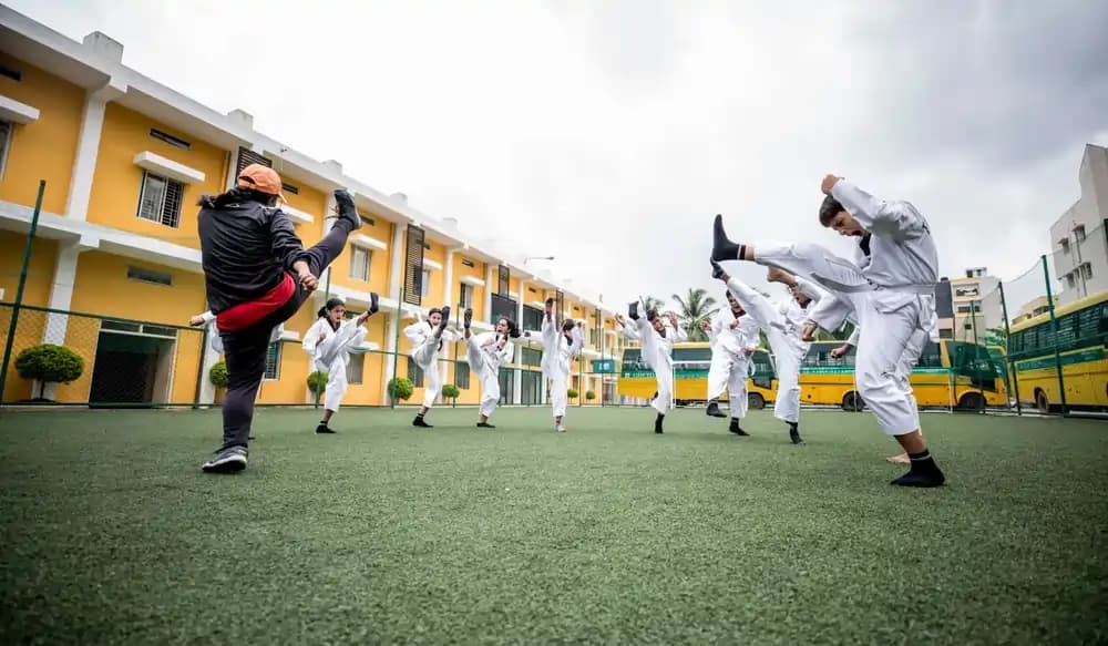 Students practicing martial arts at Orchids International School, one of the top 10 CBSE schools.